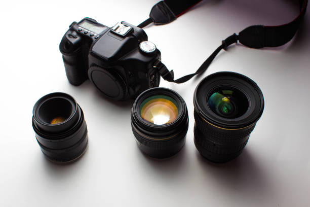 istock group of camera lenses and a mobile phone on a white background 836809540