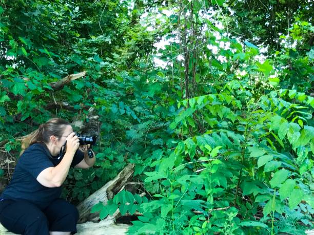 istock Woman Walking Through On A Nature Pathway 836829690