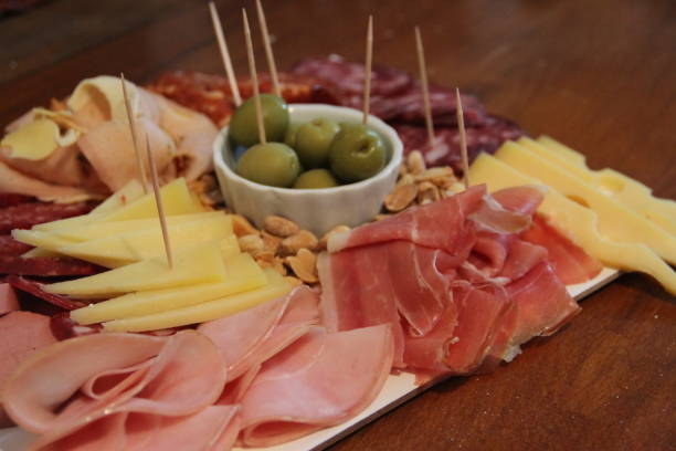 istock Chopped table of cold cuts with beer 836837942