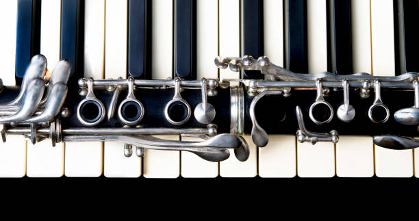 Clarinet and Keyboard. Closeup of a clarinet and keyboard. clarinet stock pictures, royalty-free photos & images
