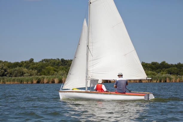istock Two man drive a sport sailing yacht in competition 836849306