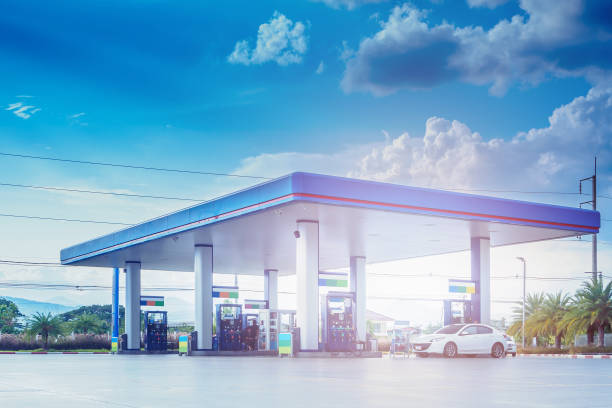 Gas station with clouds and blue sky Gas fuel station with clouds and blue sky station stock pictures, royalty-free photos & images
