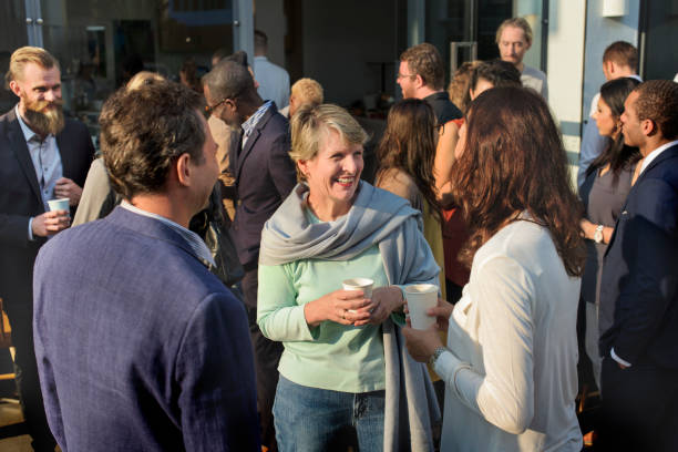 Diverse people standing talking outdoor
