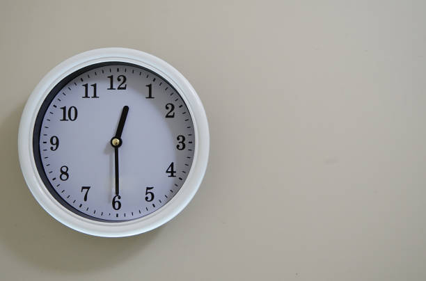 istock The time of the wall clock is 12:30 836932366