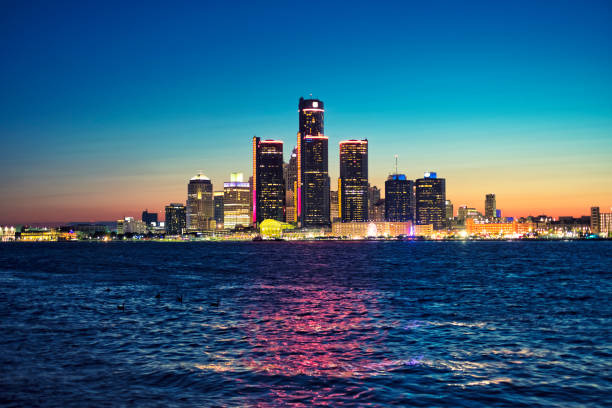 istock Detroit skyline reflected in water during sunset 836950396