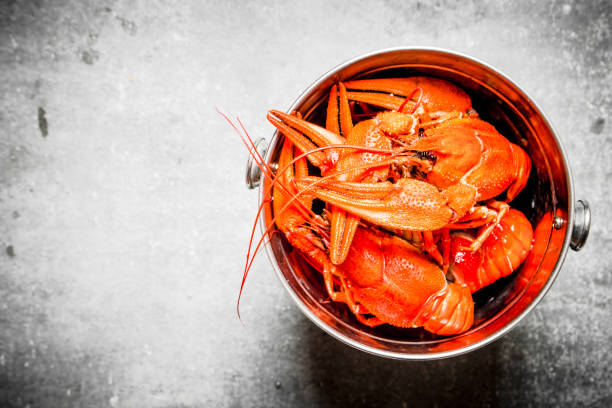 istock Boiled crawfish in a steel bucket. 836991440
