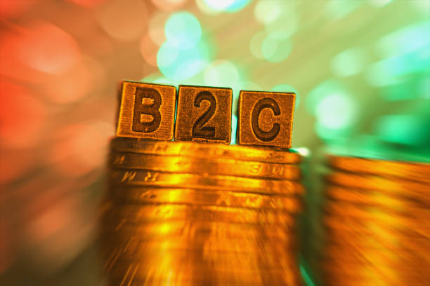 istock B2C copper alphabet on coin stack in radial blur illuminated with light 836998120