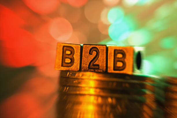 istock B2B copper alphabet on coin stack in radial blur illuminated with light 837001564