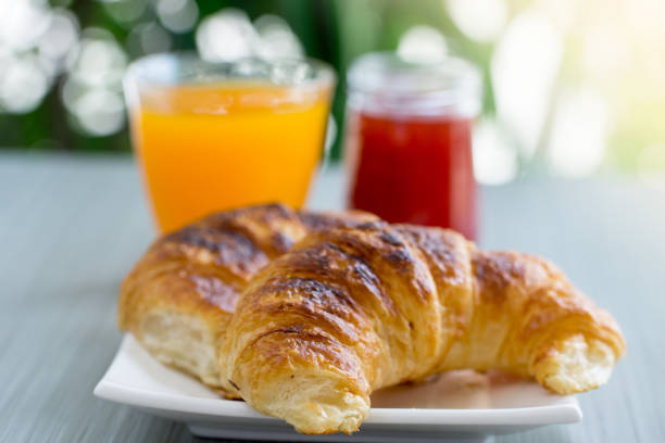 istock Breakfast with croissants, jam and orange juice, 837003290