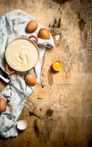 istock Mayonnaise in bowl with ingredients for cooking. 837003706