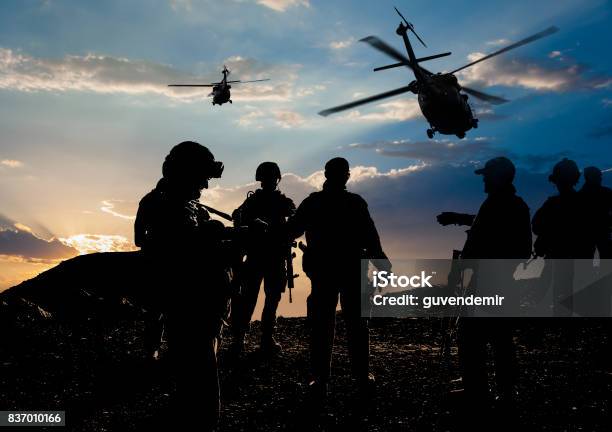 Military Mission At Dusk Stock Photo - Download Image Now - Army, Military, In Silhouette