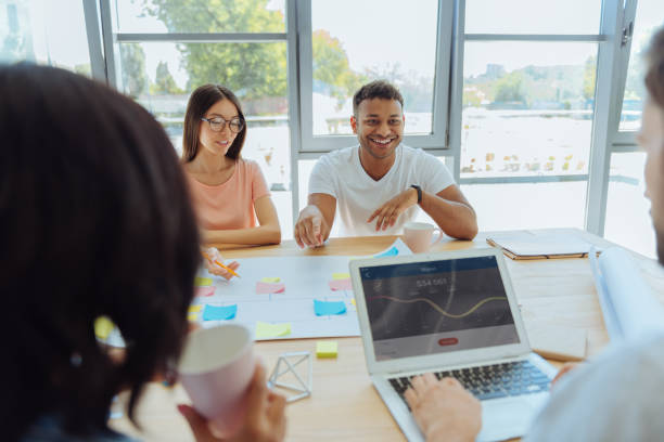 istock Pleasant smart colleagues sitting opposite each other 837034236