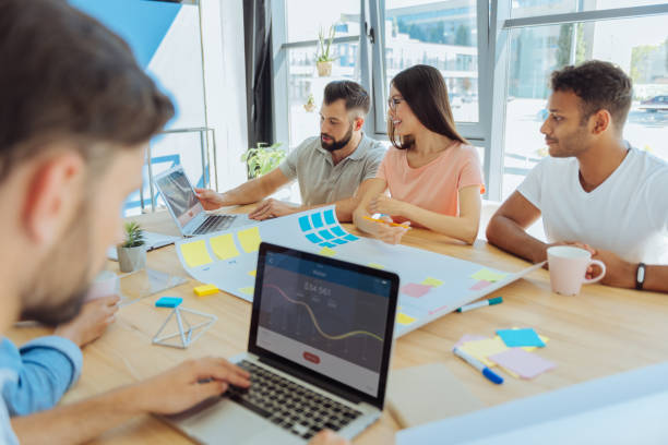 istock Enthusiastic young people organizing a startup 837034646