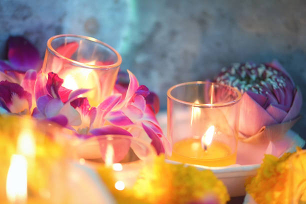 Candle lit thai culture flower walk in Asalha Puja day, Magha Puja day, Visakha Puja Day stock photo