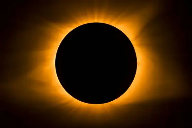 The moon covers the sun and displays the star's corona during totality. Photographed in Cerulean, Kentucky during the Total Eclipse of August 21, 2017.