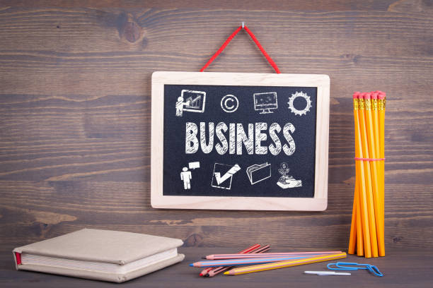 istock Business icon concept. Chalkboard on a wooden background 837061676