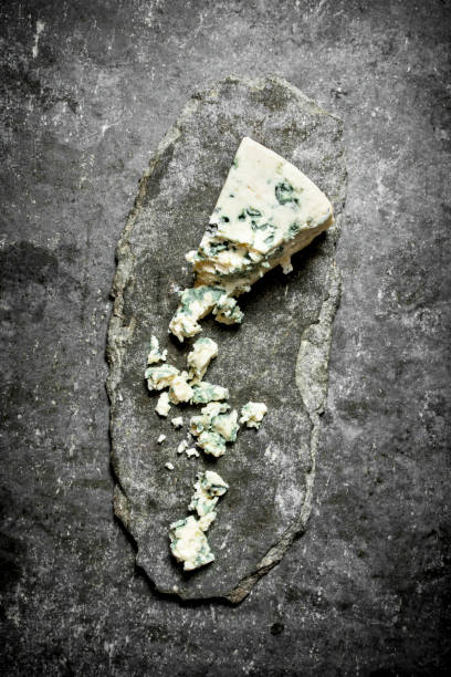 istock piece of French blue cheese . 837068952
