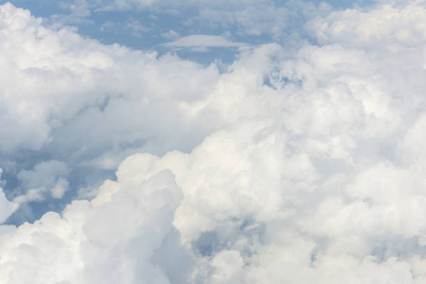 istock Blue sky and Clouds as seen through window of aircraft 837119100