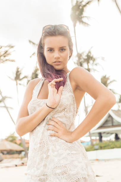 istock Pretty girl at the beach posing to camera. 837119238