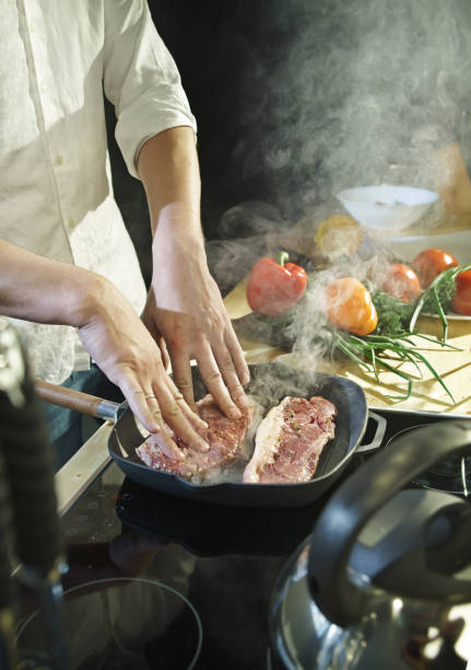 istock Cooking meat in a flying pan 837120234