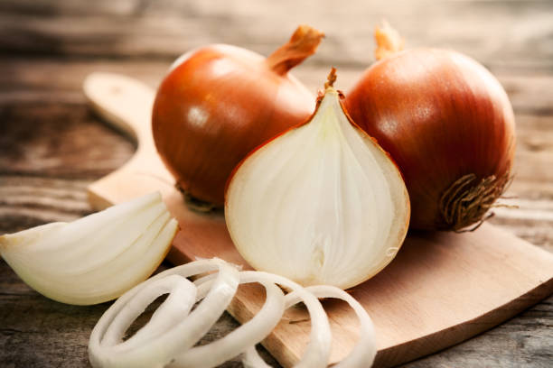 istock Fresh healthy onions on chopping board 837135232