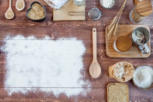 istock wheat and flour on rustic wooden table, top view, copy space 837140540