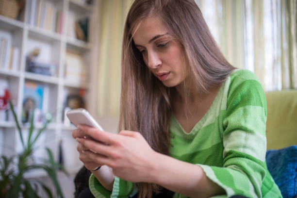 istock woman indoors 837157114