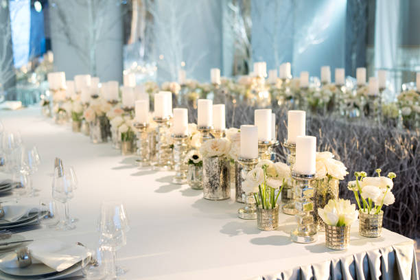 istock Banquet table decor. Candles in vases and flowers 837159080