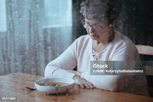 Senior Having Lack Of Appetite Stock Photo - Download Image Now - Hungry, Eating, Senior Adult