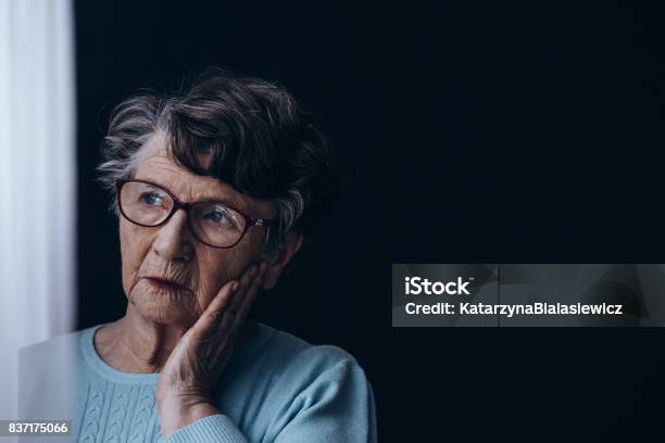 Old Woman In Dark Room Stock Photo - Download Image Now - Alzheimer's Disease, Senior Adult, Senior Women