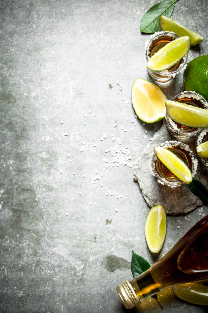 istock Tequila with salt and lime slices. 837179174