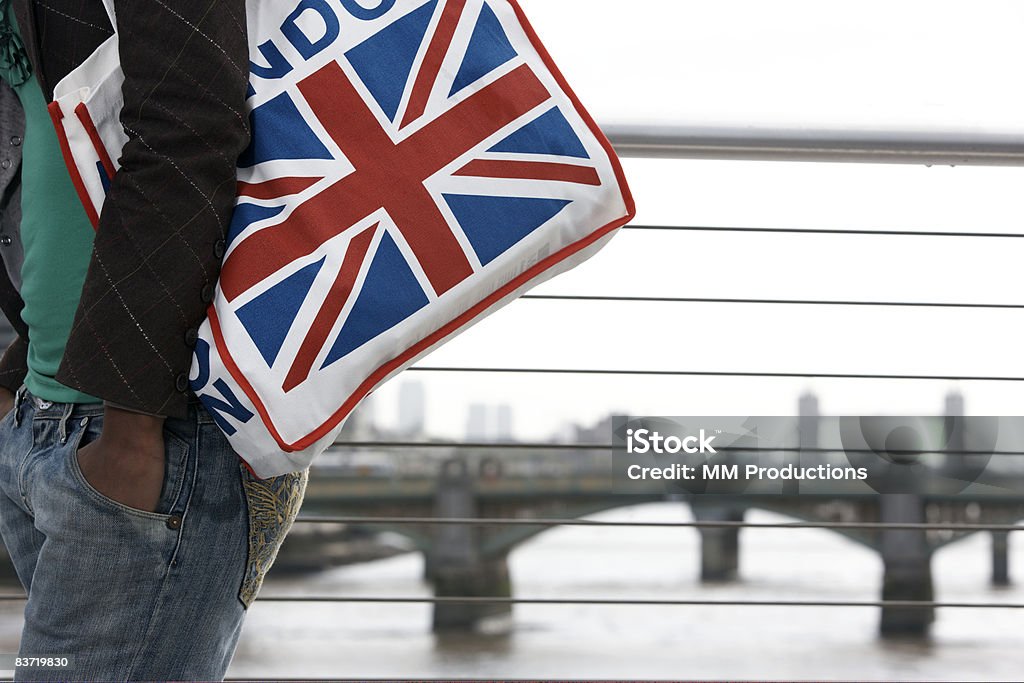 Woman carrying Union Jack bag  20-24 Years Stock Photo