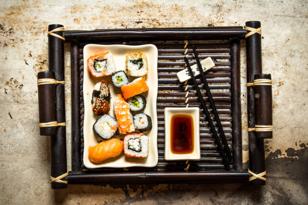 istock The rolls and sushi plate with soy sauce 837210648