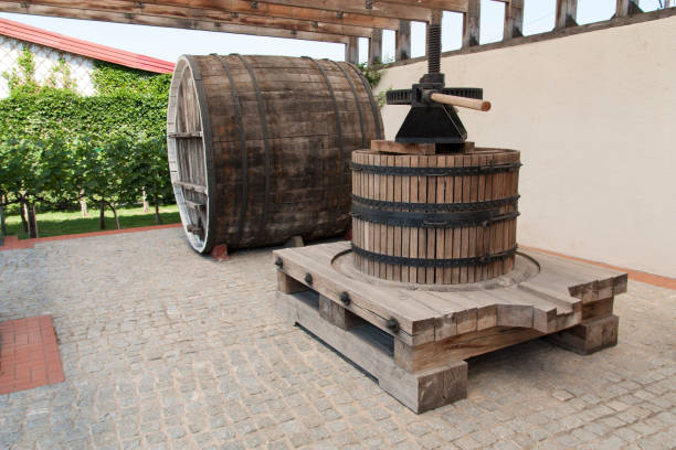 istock Grape harvest: old Wine press in a winery photo 837211000