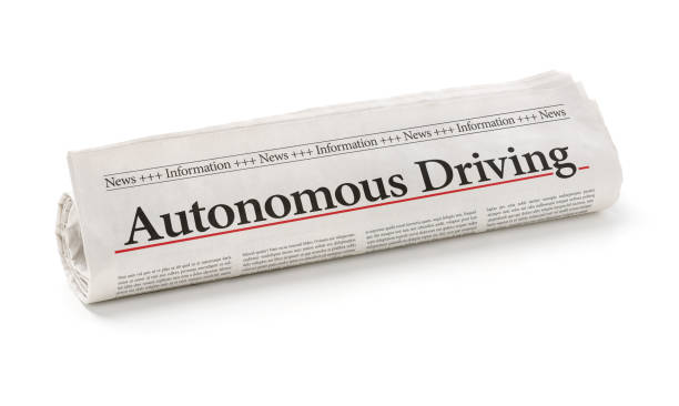 istock Rolled newspaper with the headline Autonomous Driving 837211018