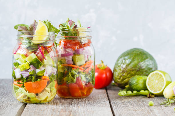 istock Takeaway vegetable green bright salad jars. 837228238