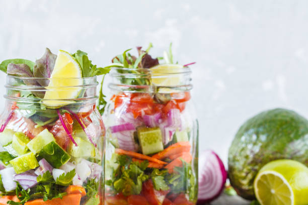 istock Takeaway vegetable green bright salad jars. 837228800