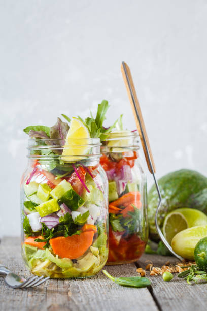 istock Takeaway vegetable green bright salad jars. 837229288
