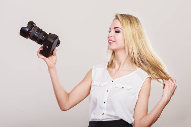 istock Beautiful woman with camera. 837235722