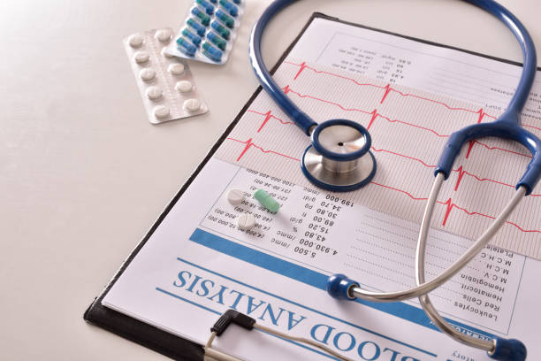 istock Clipboard with electrocardiogram and treatment of tablets on table elevated 837245662