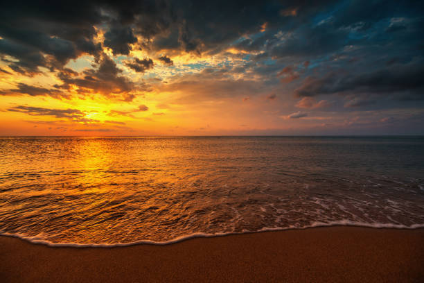 istock Beautiful sunrise over the sea with scenic clouds 837260236
