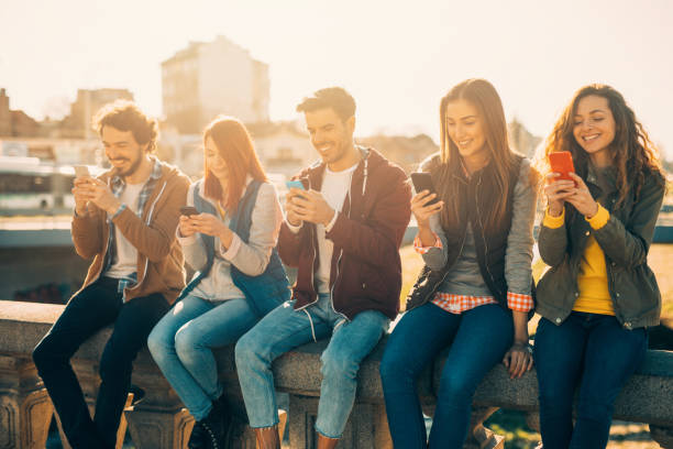 istock People texting in the city 837261580