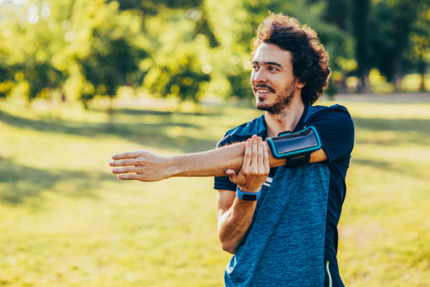 istock Sportsman stretching outdoors 837261584