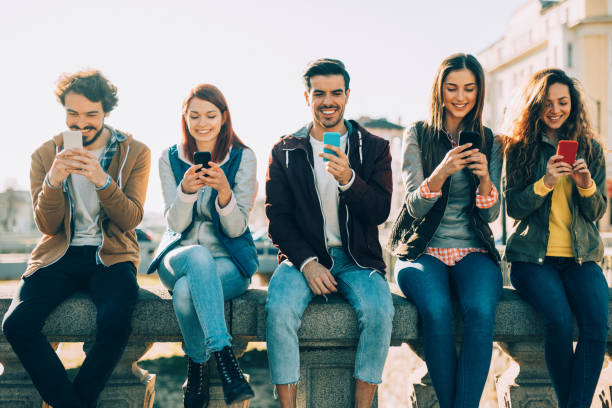 istock People texting in the city 837261586