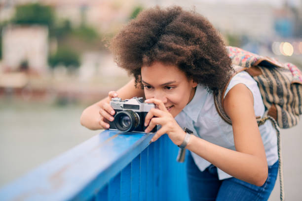 istock Mixed race touris taking a photo on the bridge 837269968