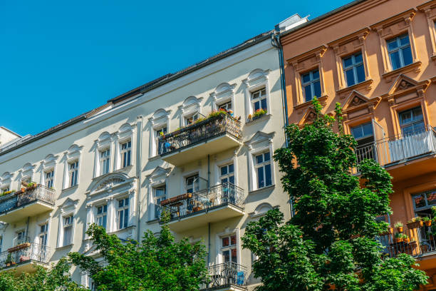 istock white, yellow and brown facaded buildings in a row 837284418