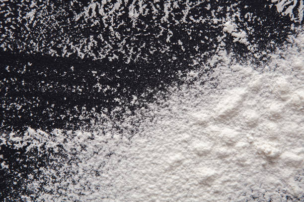istock Baking concept on black background, sprinkled flour with copy space 837284706