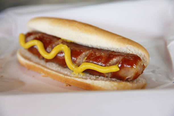 istock Hot dog sausage in close up 837290018