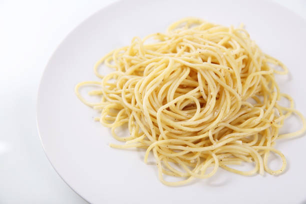 istock Spaghetti noodles isolated in white background 837291326