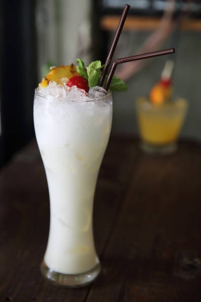 istock pina colada cocktail with pineapple and cherry fruit 837292734